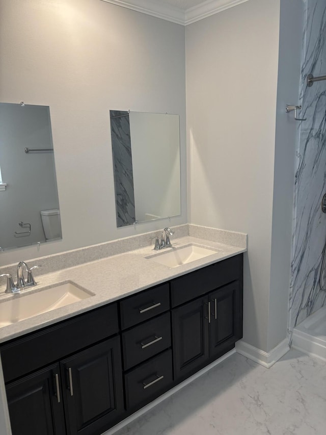 bathroom with vanity, a shower, ornamental molding, and toilet