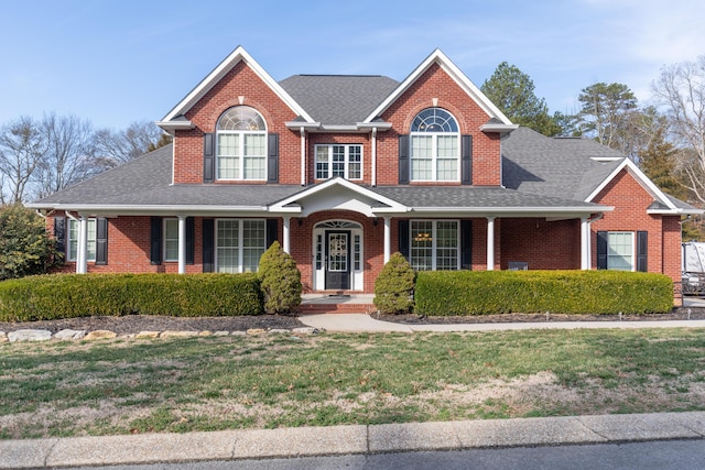 view of front of house with a front lawn