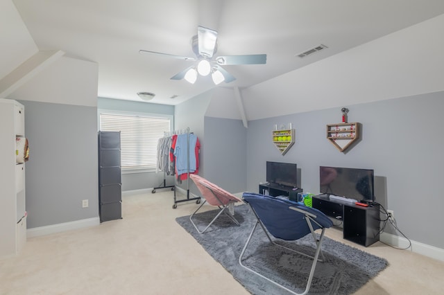 home office featuring ceiling fan, lofted ceiling, and carpet flooring