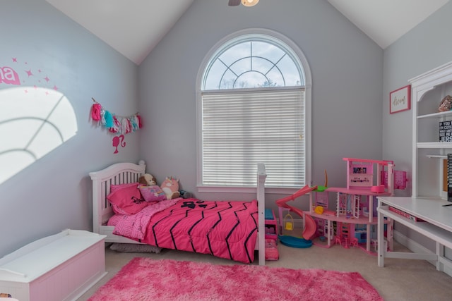 carpeted bedroom with lofted ceiling