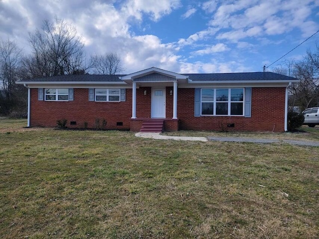 ranch-style home with a front lawn