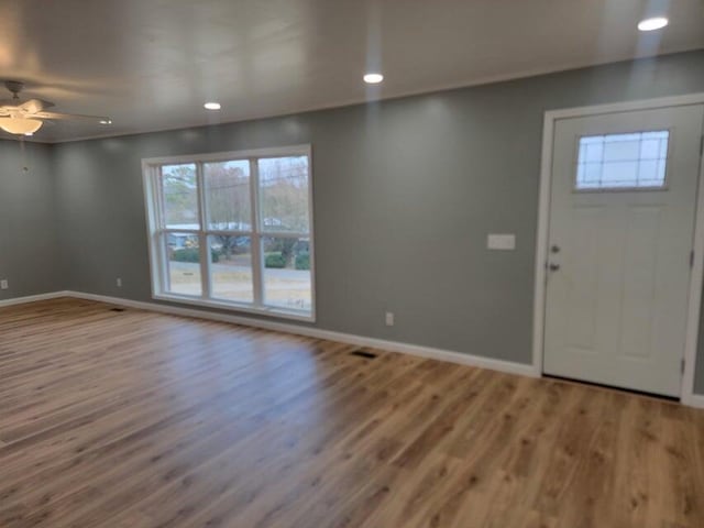 entryway with recessed lighting, baseboards, a ceiling fan, and wood finished floors
