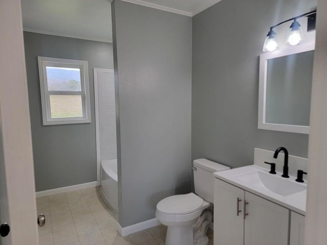 bathroom with vanity, a bathing tub, crown molding, and toilet