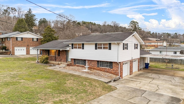 view of front of home featuring a garage, a front yard, and covered porch