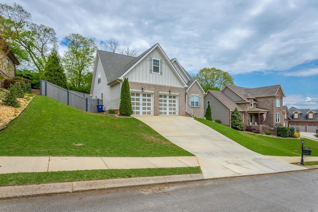 1609 Capanna Trl, Hixson, TN 37343 - craftsman house with driveway, board and batten siding, an attached garage, a front yard, and fence