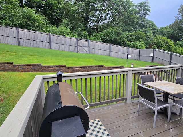 1609 Capanna Trl, Hixson, TN 37343 - deck with outdoor dining area and a fenced backyard