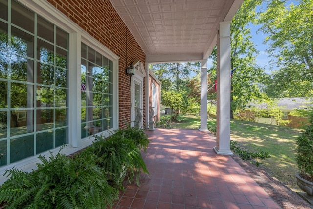 view of patio featuring a porch