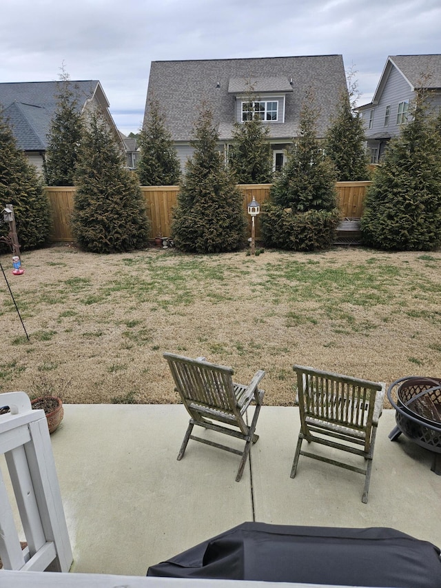 view of patio / terrace with a fire pit