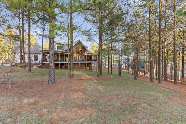 view of yard featuring a wooden deck