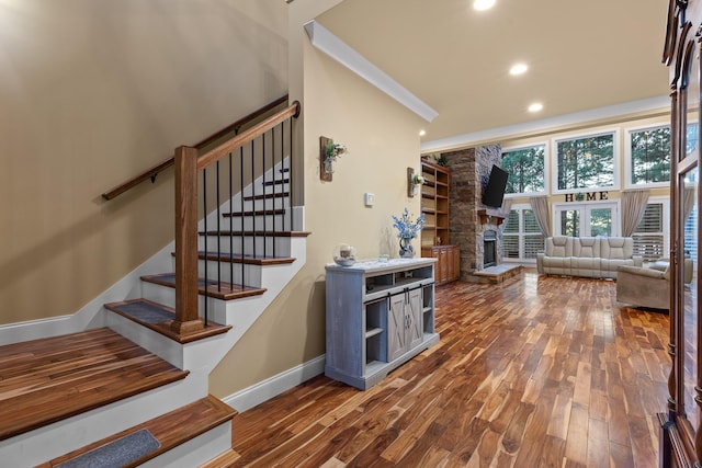 interior space with wood-type flooring and a fireplace