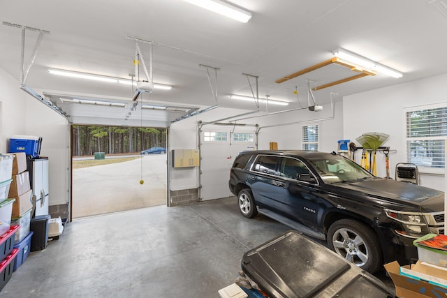 garage featuring a garage door opener