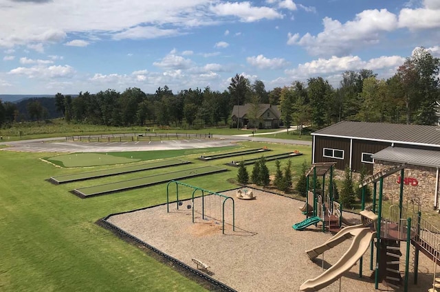 view of home's community with a playground