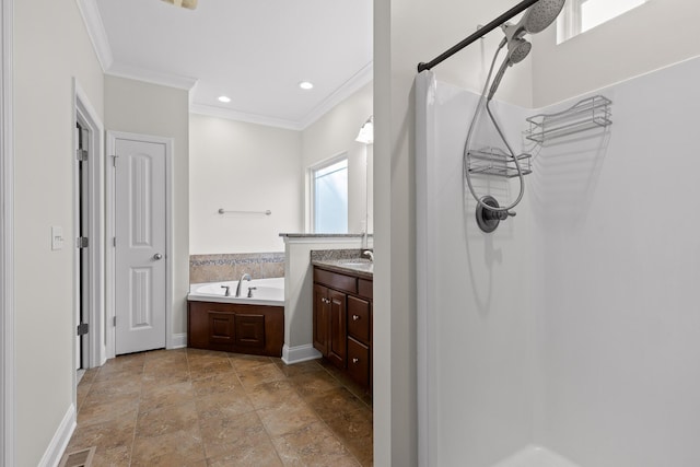 bathroom featuring ornamental molding, shower with separate bathtub, and vanity