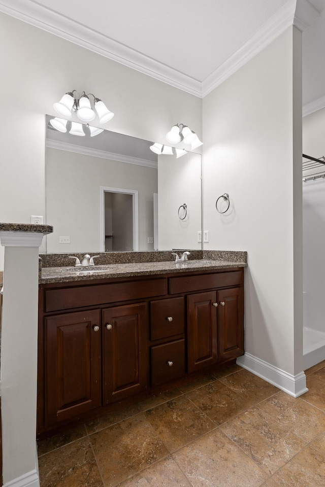 bathroom featuring vanity and crown molding