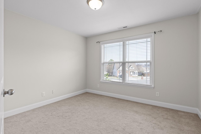 view of carpeted spare room