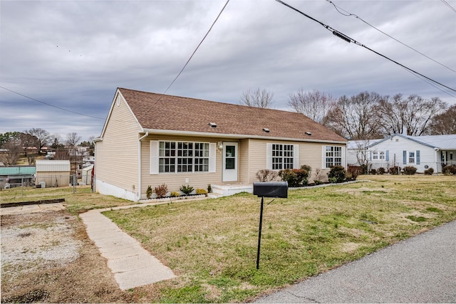 exterior space featuring a front lawn