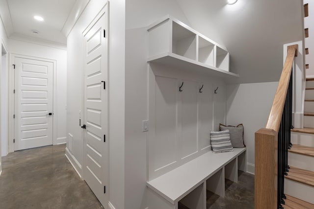 mudroom with recessed lighting and finished concrete floors