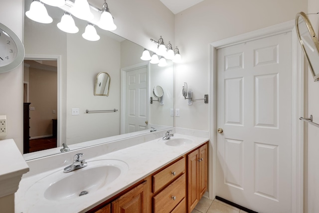 bathroom with tile patterned floors and vanity