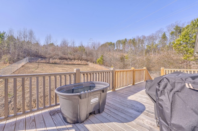 wooden deck with area for grilling