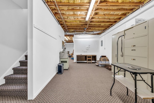 basement with carpet flooring