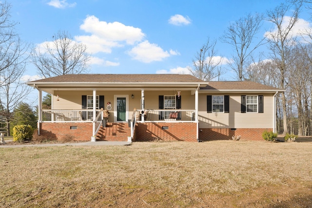 view of front of property with a front yard and covered porch