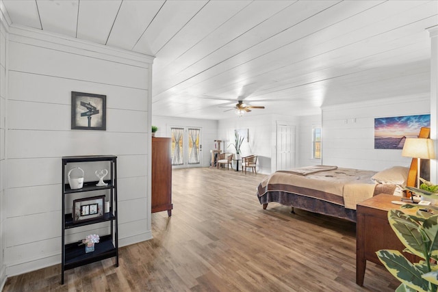 bedroom featuring wood finished floors and wood ceiling