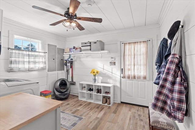 mudroom with light wood-type flooring, ceiling fan, and ornamental molding