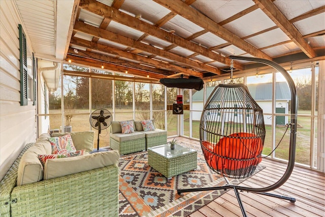 sunroom / solarium featuring a healthy amount of sunlight