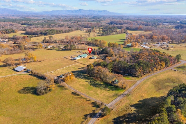 birds eye view of property featuring a rural view and a mountain view