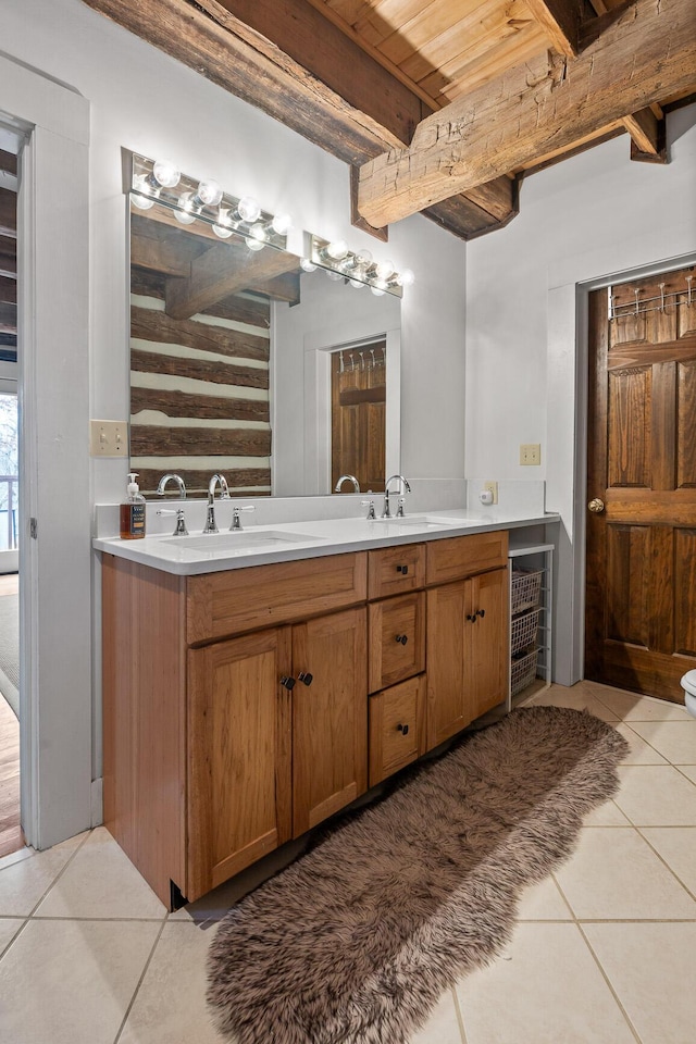 bathroom featuring tile patterned floors, vanity, wood ceiling, and beam ceiling