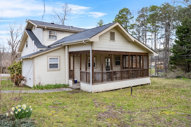 exterior space featuring a front yard and covered porch