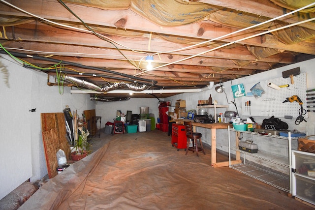 basement with a workshop area