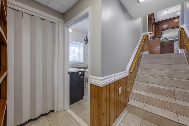 staircase with tile patterned flooring