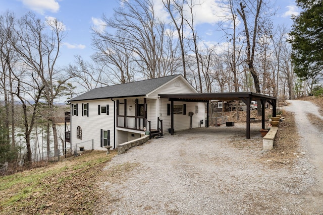 view of front of home with a carport