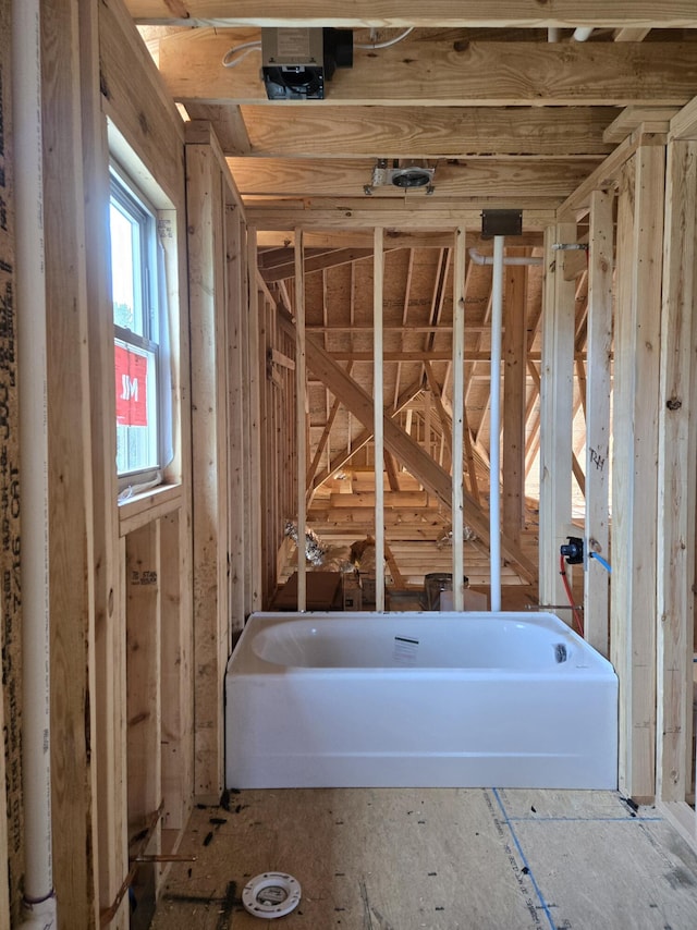 bathroom with a tub