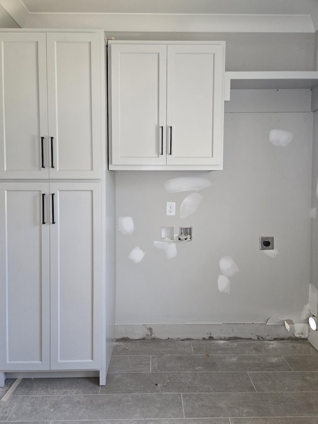 1646 Ritz Way Unit 4, Soddy Daisy, TN 37379 - washroom with hookup for an electric dryer, wood finished floors, cabinet space, and hookup for a washing machine