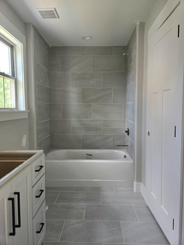1646 Ritz Way Unit 4, Soddy Daisy, TN 37379 - bathroom with vanity, shower / bathtub combination, and tile patterned flooring