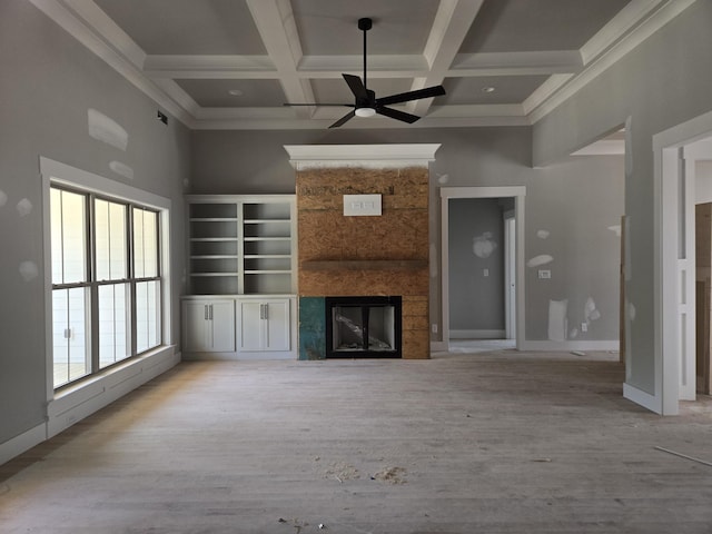 1646 Ritz Way Unit 4, Soddy Daisy, TN 37379 - unfurnished living room with a ceiling fan, coffered ceiling, a fireplace, beamed ceiling, and wood finished floors