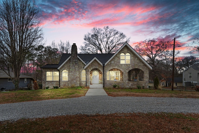 view of front of home with a lawn