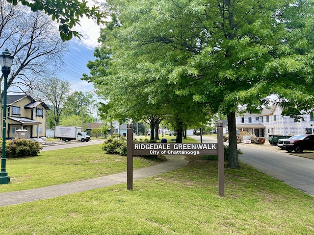 surrounding community with a lawn
