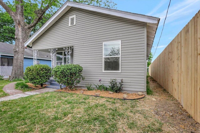 exterior space with a lawn