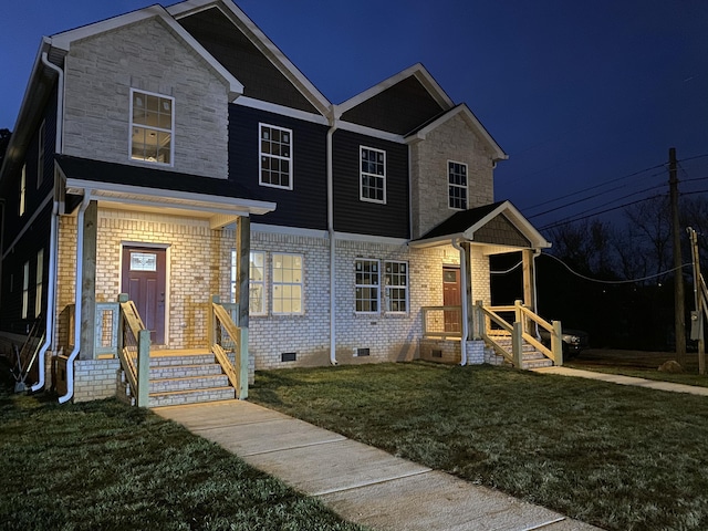 view of front facade with a front yard