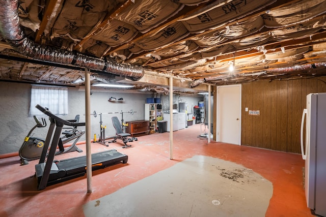 basement featuring white fridge