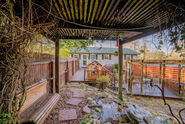 view of yard with a wooden deck