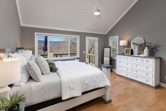 bedroom with baseboards, ceiling fan, light wood-style flooring, vaulted ceiling, and crown molding