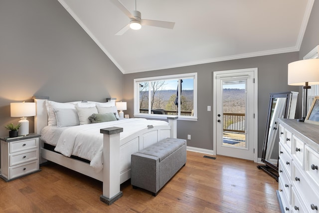 bedroom with access to outside, crown molding, and wood finished floors