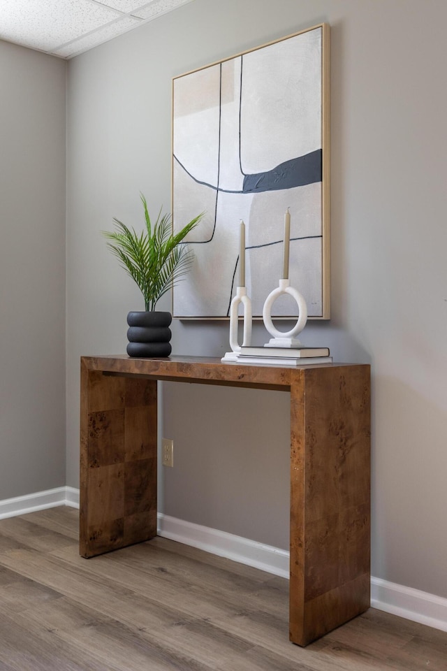 interior details with wood finished floors and baseboards