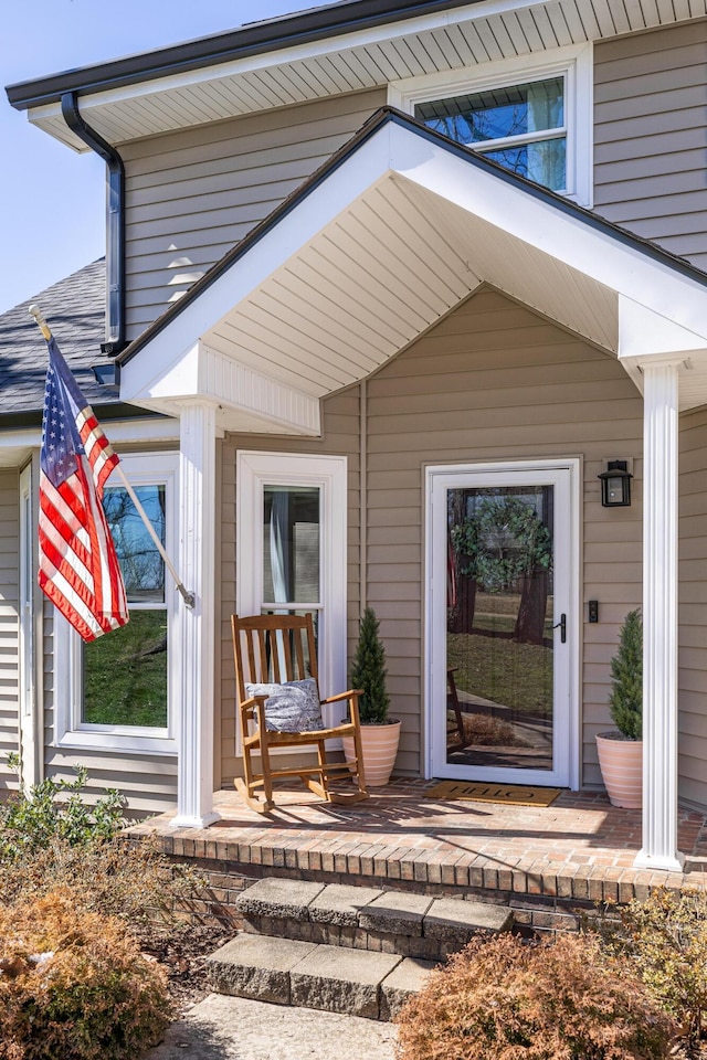 property entrance featuring covered porch