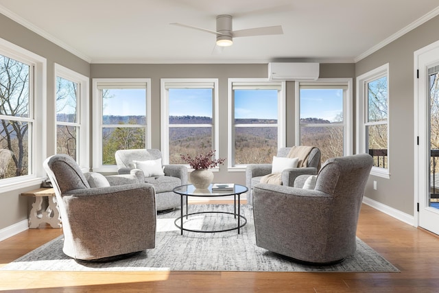 sunroom / solarium featuring a ceiling fan and an AC wall unit