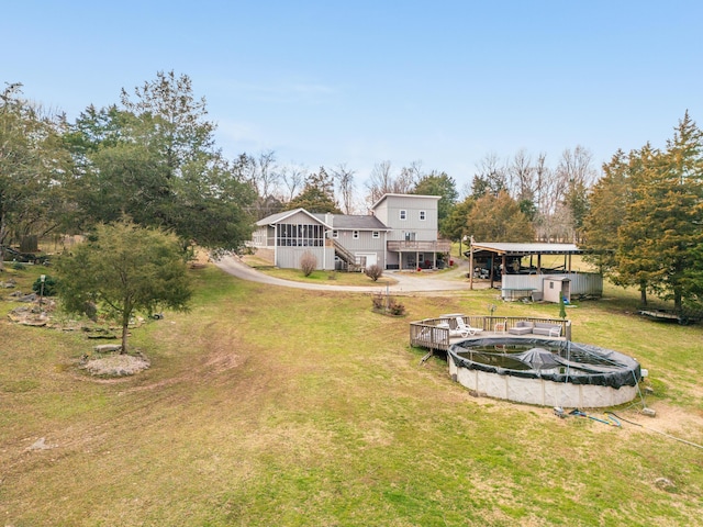 view of yard with a wooden deck